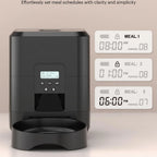 LCD display close-up showing programmable meal times and portion settings