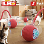 Two red interactive cat ball toys with tails rolling as cats chase them