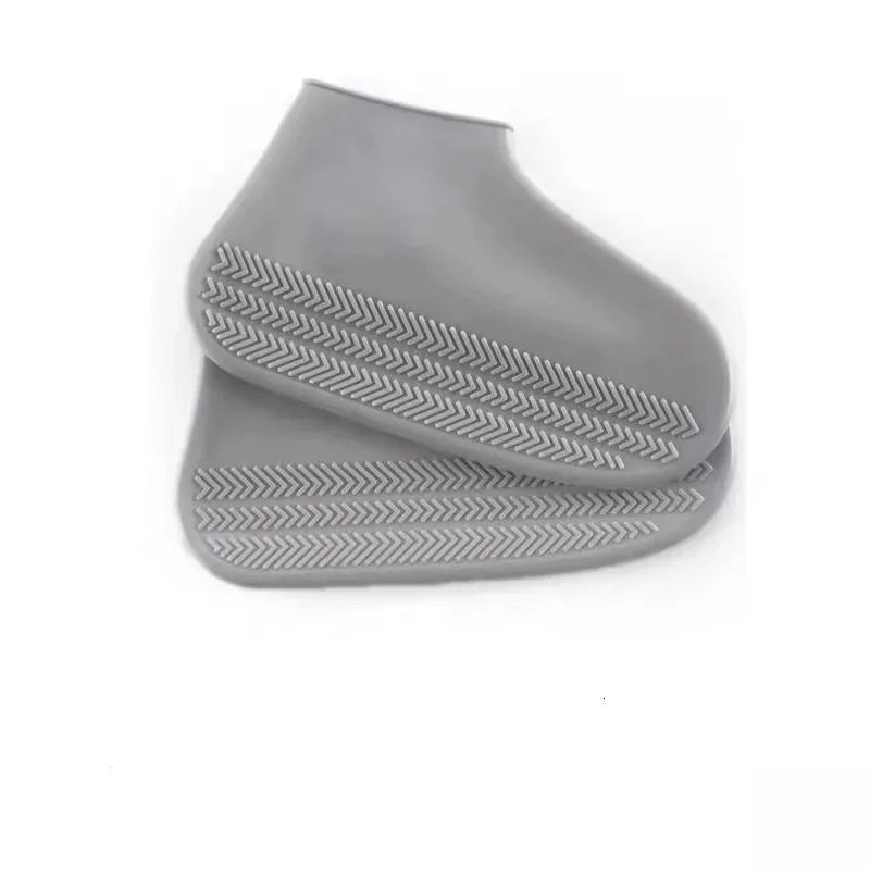 Grey waterproof silicone shoe covers with non-slip tread sole